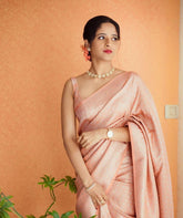 KASTURI TRENDZ Elegant Peach Silk Saree with Gold Detailing